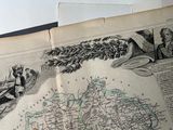 an old book with a map of the country of england
