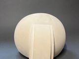 a white object that is sitting on a table