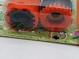two orange and black garden hoses in a package