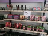 a lot of different types of cosmetics on the shelves