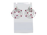 a pair of ruby and diamond earrings