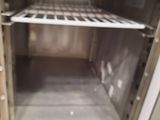 an open oven with a lot of food inside of it