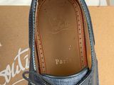 the shoe is blue and has a lace on the sole