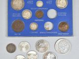 un assortiment de pièces britanniques comprenant un penny, un penny, un penny, un penny, un penny et un penny