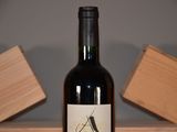 a bottle of wine that is sitting on a table