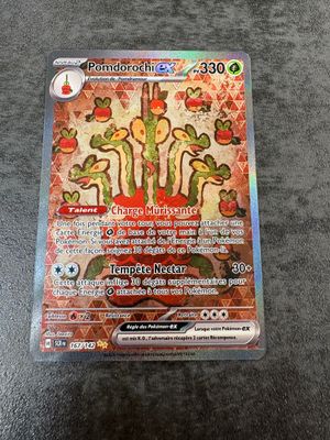 a close up of a pokemon card on a table