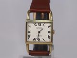 a watch with roman numerals on the face of it