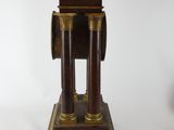 a clock that is sitting on top of a table