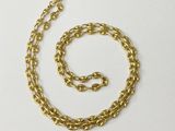a gold plated chain with a clasp on a white background