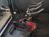 a stationary exercise bike in the corner of the room
