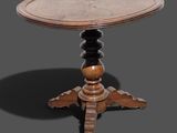 une vieille table en bois avec un plateau rond et un piètement en bois