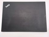 a black mouse pad with a black logo on it