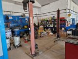 an image of a garage with a lot of tools on the floor