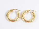 gold plated hoop earrings on a white background