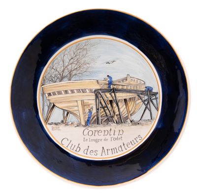 a plate with a picture of a boat on it