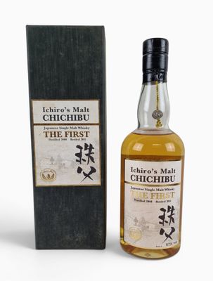 a bottle of chichibu whisky next to a box