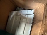 a cardboard box that has a bunch of refrigerators inside of it