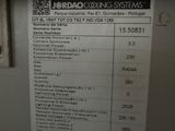 a label on the side of a machine that is on the wall