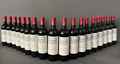 a group of bottles of wine sitting on top of a table