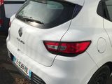 a white car that is parked in a parking lot