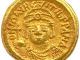 une pièce d'or portant l'image d'un homme