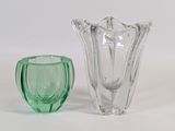 two vases that are sitting next to each other
