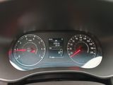 a close up of a car dashboard with a speedometer and gauges