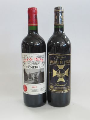 two bottles of wine sitting next to each other on a table