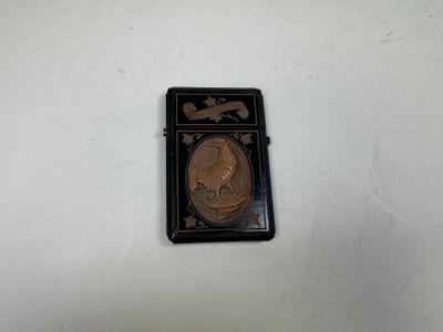 a lighter that has a picture of a horse on it