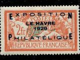 un timbre orange et noir représentant un homme à cheval