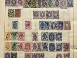 an old book with a lot of different stamps on it