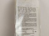 the back of a bottle of liquid with a barcode on it