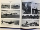 a book with pictures of airplanes in it on a table