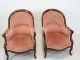 pair of antique french style chairs with pink velvet upholstered seats