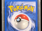 a pokemon now sold card in a plastic case