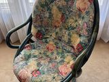 a chair that is sitting in front of a window