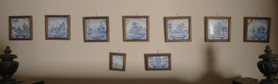 pictures hanging on the wall of a living room