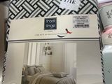 a package of bedding on a table in a store