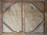 a picture of an old window with a blue sticker on it
