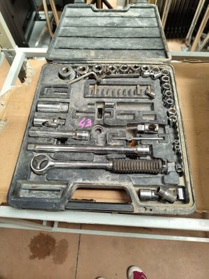 a tool tray that has a bunch of tools in it