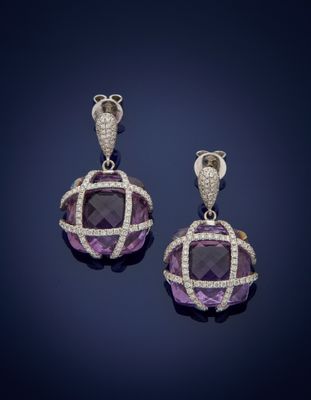 a pair of amethorate and diamond earrings