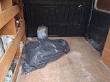a picture of the inside of a van with the door open