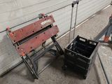 a bench that is sitting next to a tool box