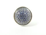 a close up of a ring with blue and white stones