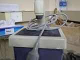 a machine that is sitting on the floor in a room