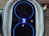 a close up of a person ' s hand holding a smart device