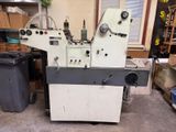 an image of a machine that is in a garage