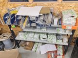 a shelf with many items on it in a room