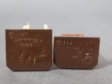 a pair of chocolate bars sitting on top of each other