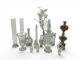 a lot of glass vases and vases on the table